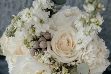 a bouquet of white roses and peonies close up, horizontal image