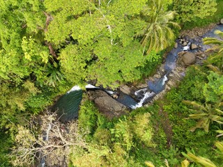 Beautiful aerial view - Natural panorama, Small river in tropical forest, in West Java-Indonesia.
