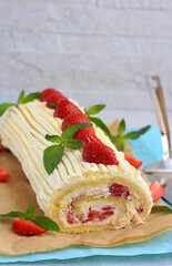 Cream and strawberry roll