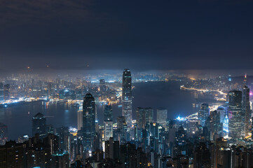 Fototapeta premium Night scenery of Victoria harbor of Hong Kong city before dawn