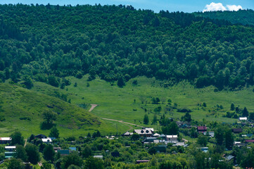 Fototapeta na wymiar Tourist gem - Shiryaevo village in a picturesque forest and mountain range Zhigulevsky State Reserve, located in the National Park 