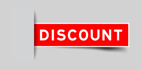 Inserted red color label sticker with word discount on gray background