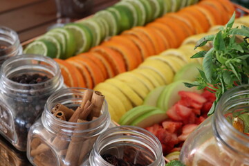 Fresh fruits such as lemons, oranges, green apples and strawberries sliced and ready to be served with spices as drinks or food. Goiania, Goias, Brazil 