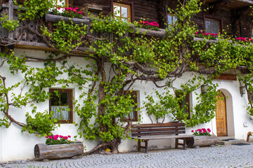 Fototapeta na wymiar A traditional Austrian mountain farm house in the alpine village of Doelsach, East Tyrol, Austria