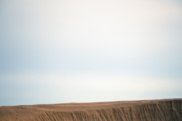 Fototapeta na wymiar Desert with open sky and copy space