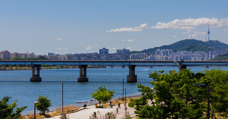 Obraz premium view of the han river, the namsan tower and the bridge