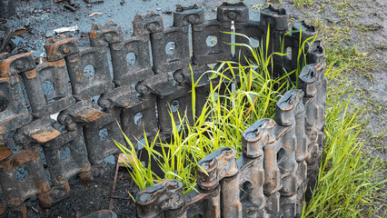 The war in Ukraine, the downed caterpillar of the tank lies on the road