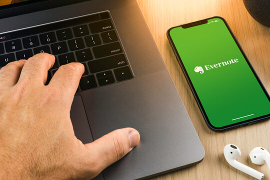 Evernote for note taking, organizing, and archiving app on the smartphone screen on wooden background. Office environment. Rio de Janeiro, RJ, Brazil. June 2022