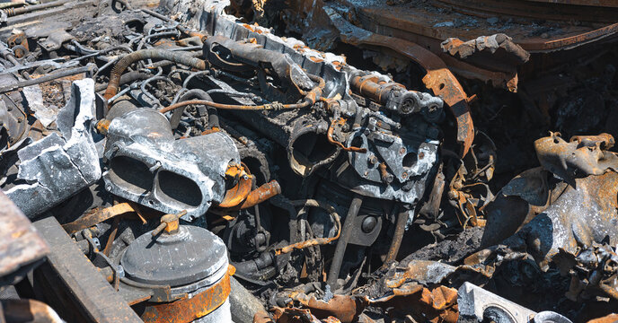 The war in Ukraine, burned tank, burned engine compartment of the tank, burned and slightly disassembled tank engine.