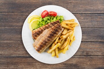 Tasty fresh fish in a restaurant for family dinner.