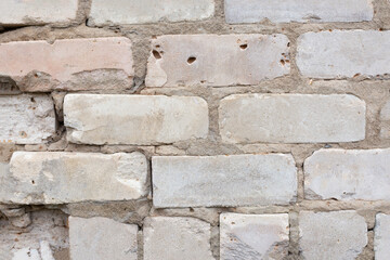 The texture of an old ruined brick wall. Background, brickwork.