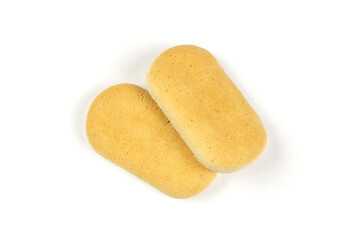 Two oval wheat (cereal) cookies for the baby close-up on a white isolated background.