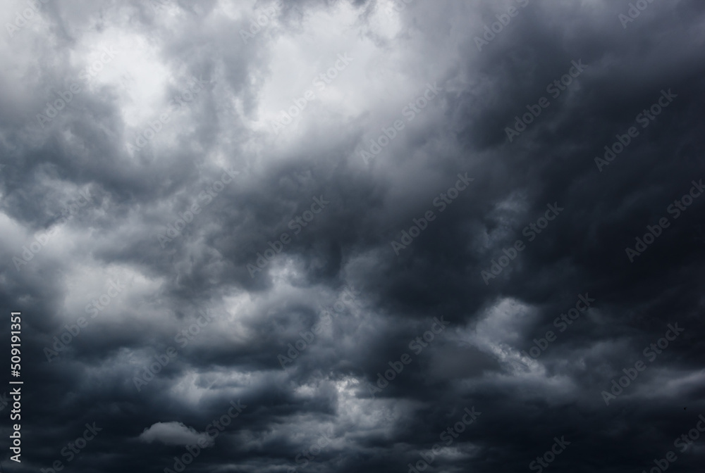 Aufkleber the dark sky with heavy clouds converging and a violent storm before the rain.bad or moody weather s