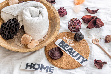 Spa composition with towel and sea salt.