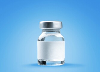 A medical liquid for injection in a glass vial on the desk