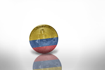 bitcoin with the national flag of colombia on the white background. bitcoin mining concept.