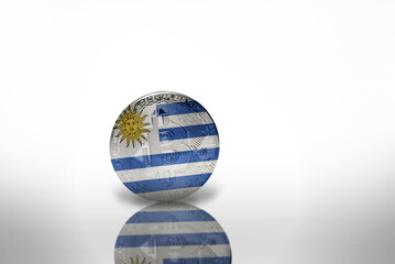 bitcoin with the national flag of uruguay on the white background. bitcoin mining concept.