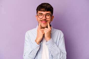 Young caucasian man isolated on purple background doubting between two options.