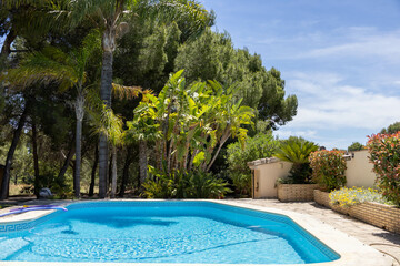Mediterranean holiday destination with blue swimming pool