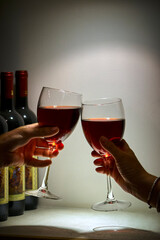 Above the glasses with the red wine