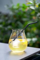 relaxing with friends one glass of limoncello orangcello spritz cocktail with one black drinking...