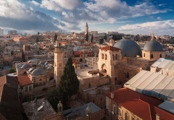Fototapeta na wymiar Jerusalem top view above postcard. Church of the Holy Sepulchre and tower of Terra Sancta church in Old City