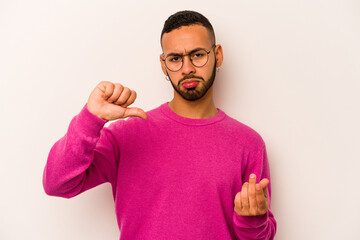 Young hispanic man isolated on white background showing that she has no money.