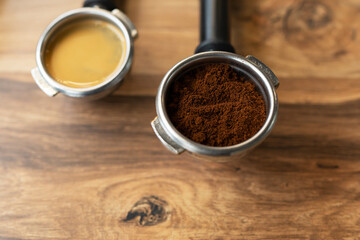Different processes of preparing coffee by a barista in a coffee shop. Coffee ground and ready. Coffee art concept. Top view, place for an inscription.