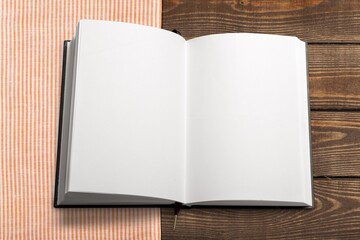 Open blank cookbook. Antique recipe book on the table.