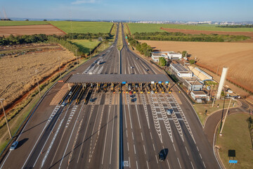 Ribeirão Preto, São Paulo / Brazil - Circa June 2022: Highway toll plaza and speed limit with...