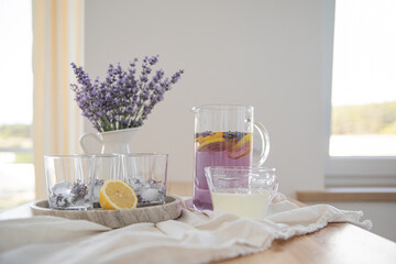 Making a refreshing summer drink. Preparing lemonade in the kitchen. Healthy food concept