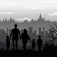 Silhouette of a family on the background of the city.