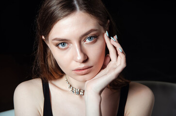 Obraz premium Beautiful skin woman face healthy beauty skin care female model on a dark background