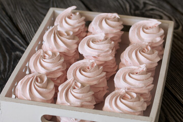 Homemade marshmallows are laid out on a tray. Homemade natural marshmallow. Close-up.