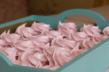 Homemade marshmallows are laid out on a tray. Homemade natural marshmallow. Close-up.