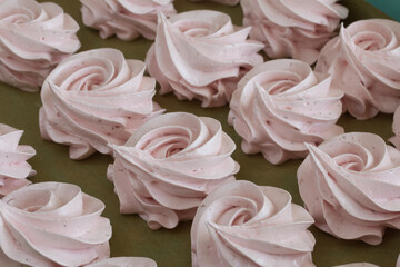 Homemade marshmallows are laid out on a tray. Homemade natural marshmallow. Close-up.