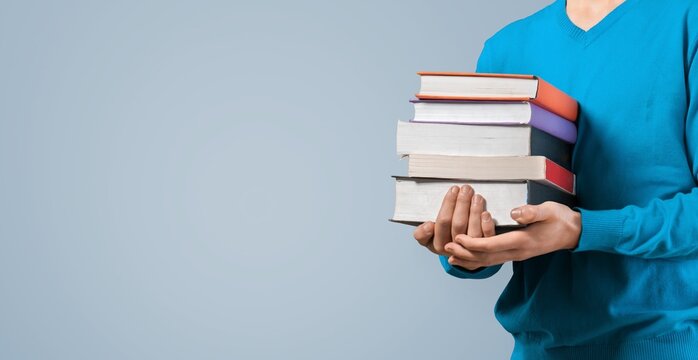 banner illustrating the examination in 2022, student with books