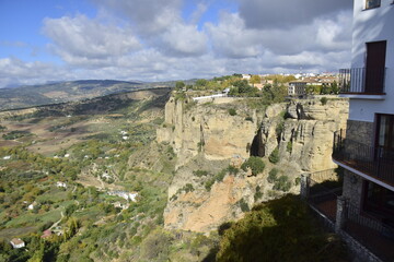 Fototapeta premium Ronda, Andalusia, Spain - 08 november 2019: View of the valley and the rocks at the foot of the town of Ronda
