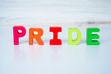 Word pride in colored block kids lettering