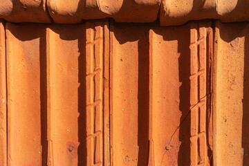View of roof tiles on guest house. Retro styling of roof with tiles.