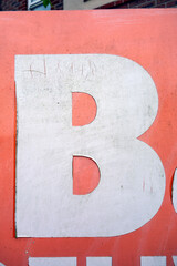 Written Wording in Distressed State Typography Advertising Letter B