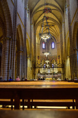Fototapeta na wymiar Pamplona, Spain - 5 October 2019: Ornate interior of the Catholic Catedral de Santa Maria la Real, 15th Century Gothic Cathedral