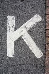 Written Wording in Distressed State Typography Advertising Letter K