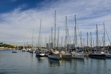 Fototapeta na wymiar Yachts at marina in famous Port Vell. Barcelona, Spain
