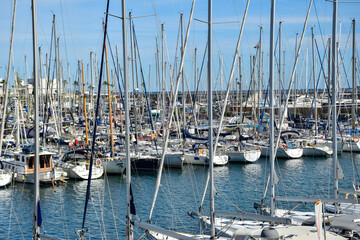 Fototapeta premium Barcelona, Spain - 3 October 2019: Yachts at Port Vell in Barcelona