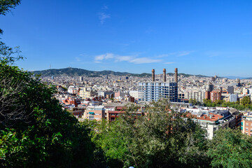 Fototapeta na wymiar Barcelona, Spain - October 3 2019: Panoramic view of Barcelona from Park Guell in a autumn day in Spain