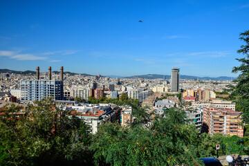 Fototapeta na wymiar Barcelona, Spain - October 3 2019: Panoramic view of Barcelona from Park Guell in a autumn day in Spain