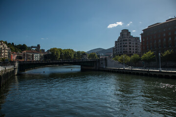 Fototapeta na wymiar Bridge over the water canal in Bilbao. The Northern Way of St. James, Spain