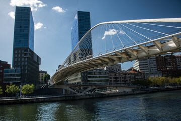 Fototapeta premium Bridge over the water canal in Bilbao. The Northern Way of St. James, Spain