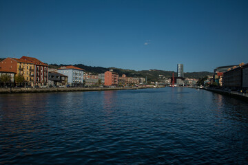 Fototapeta na wymiar Residential area along the water canal, near the port of Bilbao. The Way of St. James, Northern Route, Spain